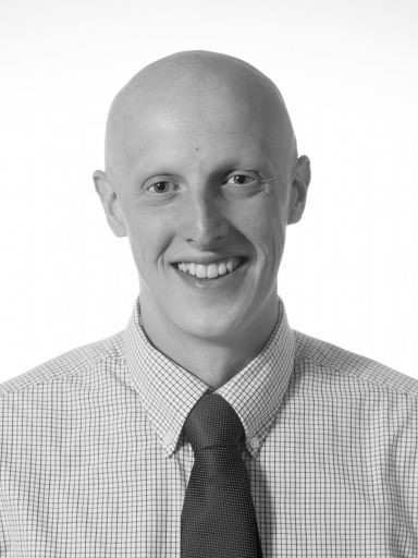 A black and white photo of Aaron Hobson