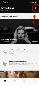 A screenshot from the MyWellness app home page, with a red arrow and circle pointing to a QR code reader in the upper right hand corner