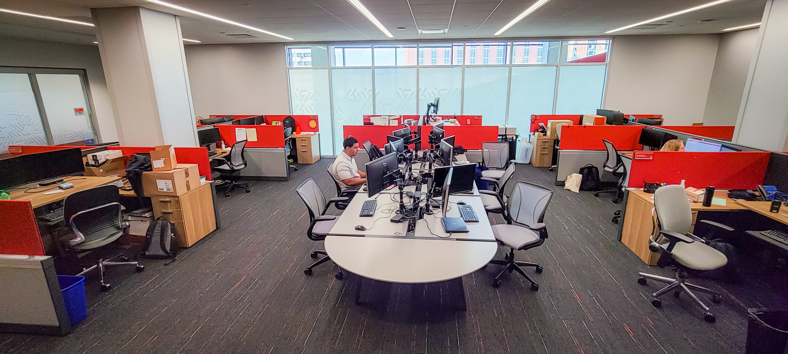 Photo of office with computer and chairs.