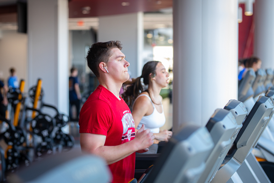 A photo of students running on treadmills