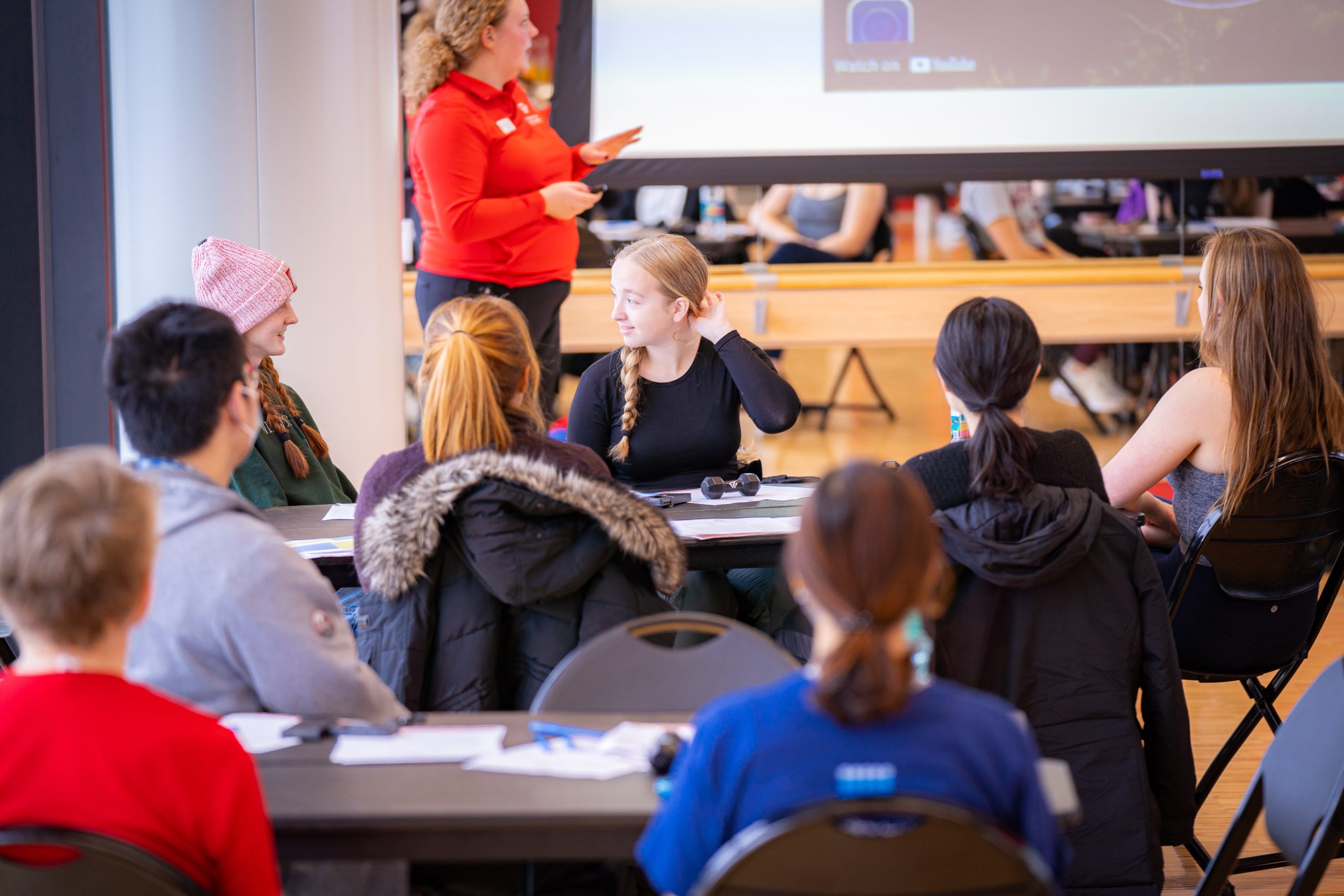 A photo of a student during a wellbeing workshop.
