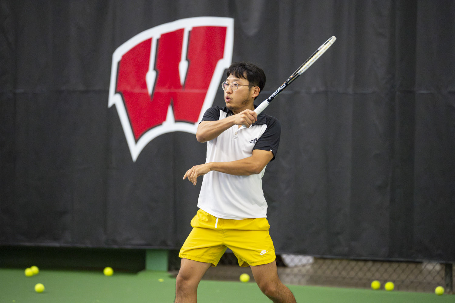 A photo of a members playing tennis at Nielsen Tennis Stadium.