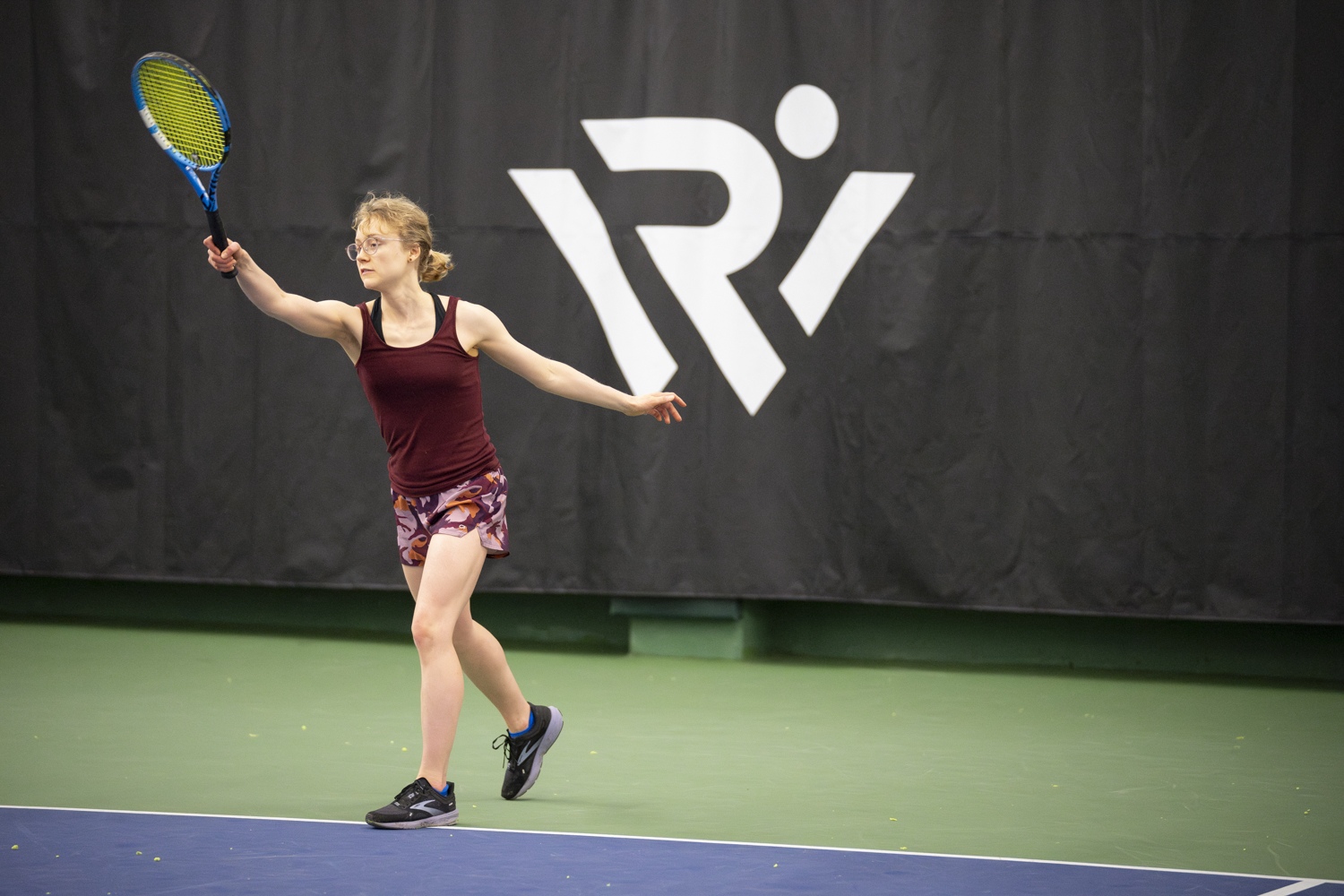RecWell member playing tennis at the Nielsen Tennis Stadium