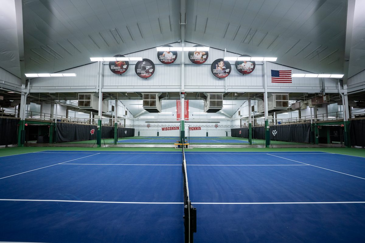 A photo of a blue and green tennis court at Nielsen Tennis Stadium