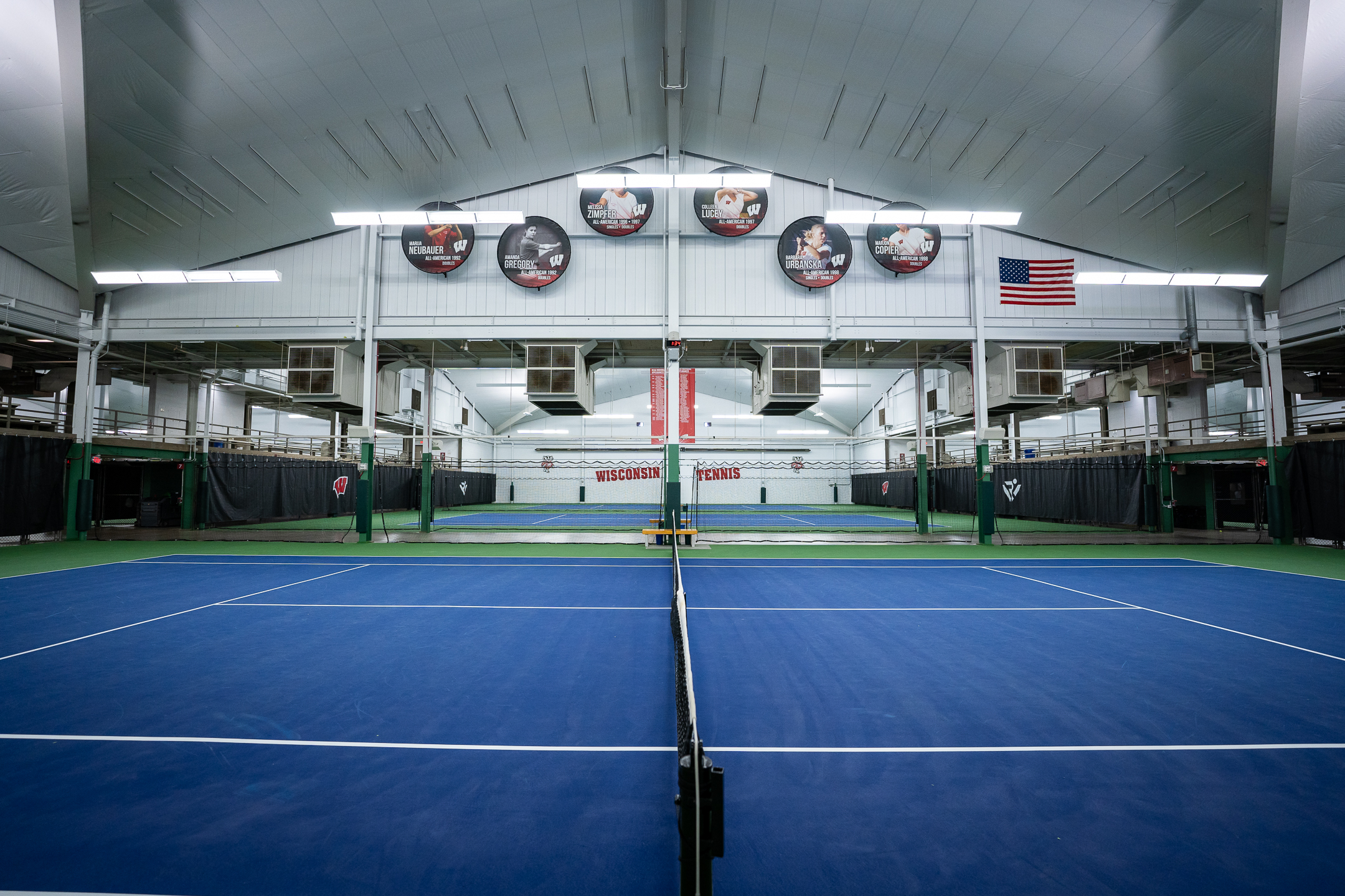 A photo of a blue and green tennis court at Nielsen Tennis Stadium