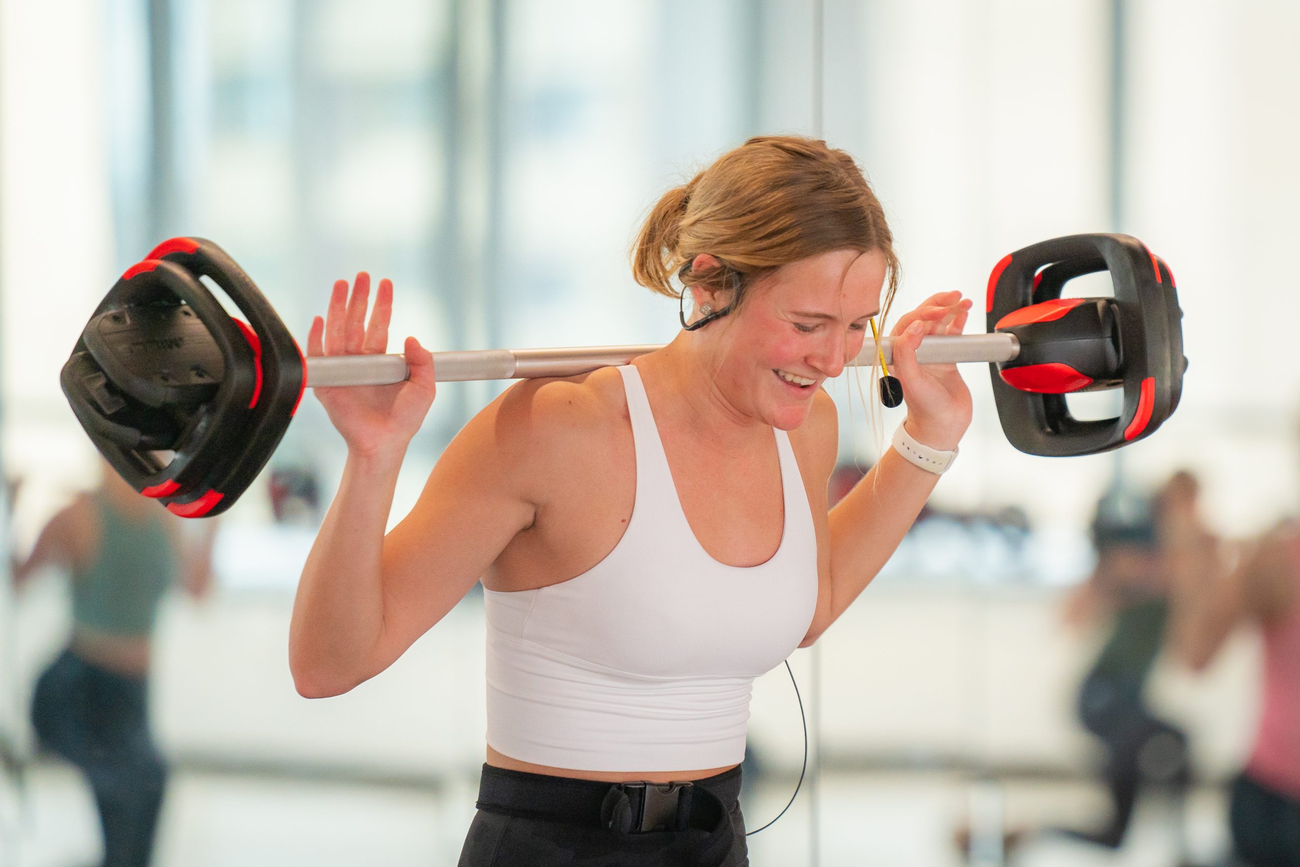 Image of a group fitness instructor leading a class.