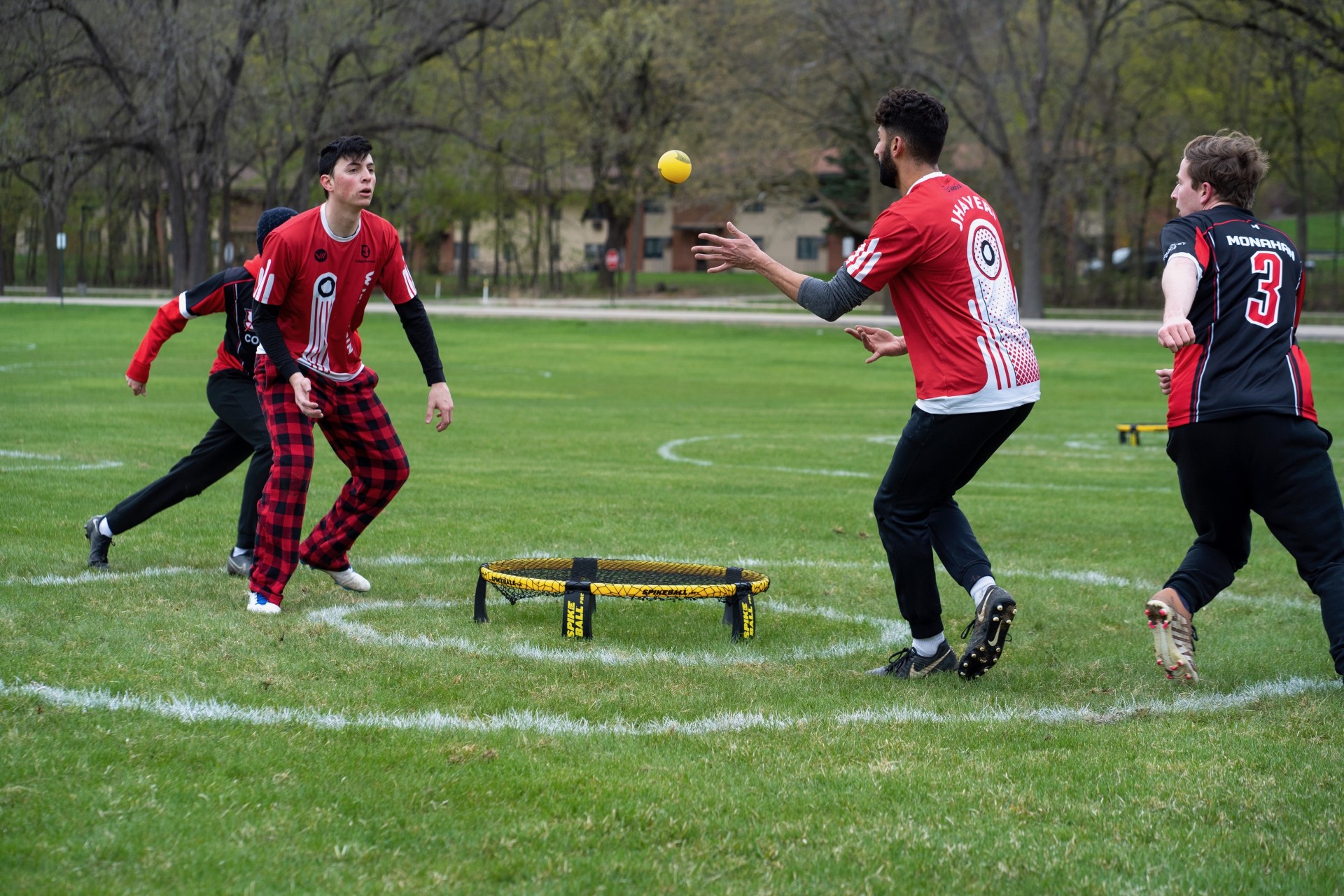Image of members playing playing Spikeball