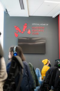Students and members playing video games in the newly opened Esports room at the Bakke Recreation and Wellbeing Center.
