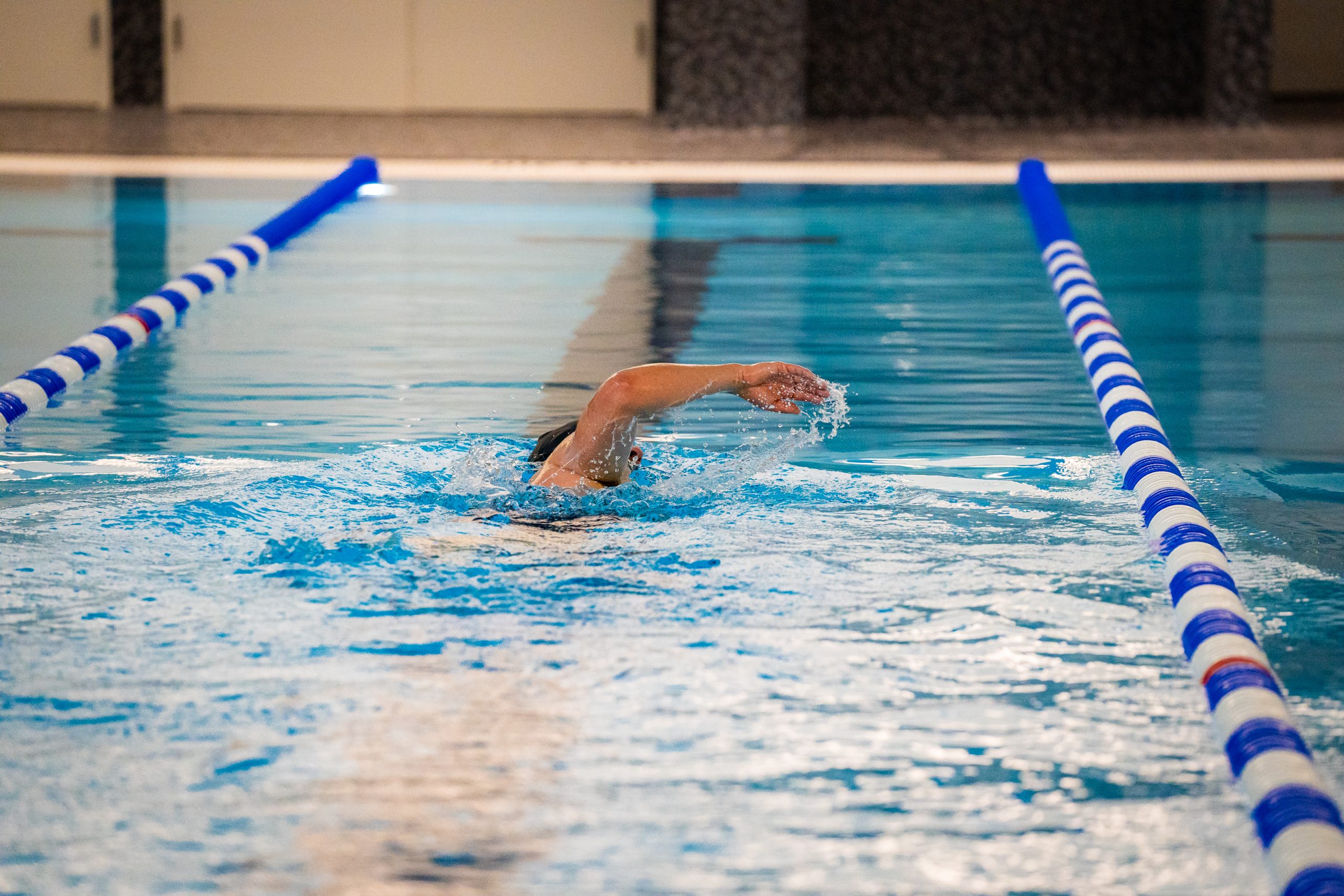 Person swimming pool.