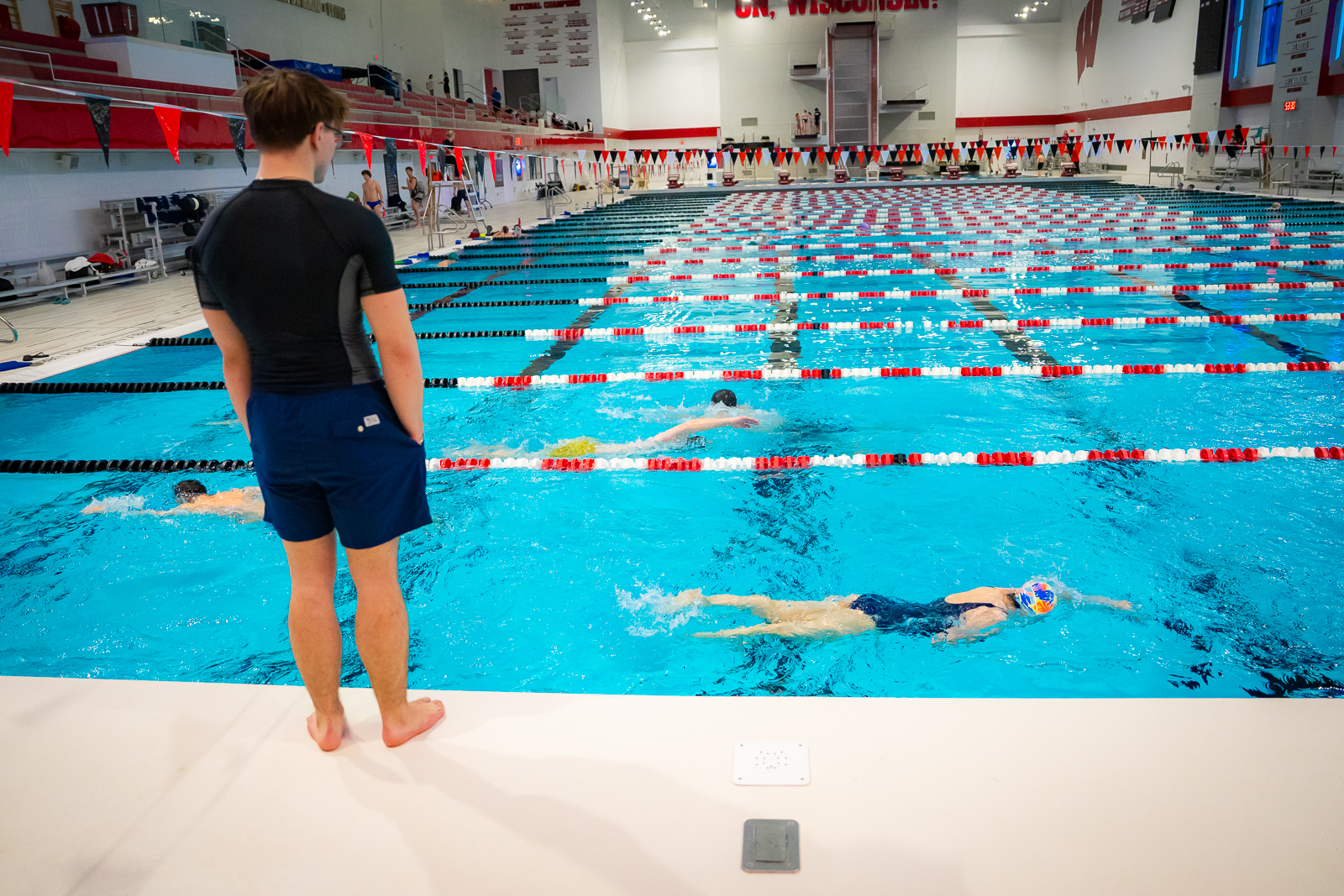 Rec Well members perform the front stroke in a Masters Swim class.
