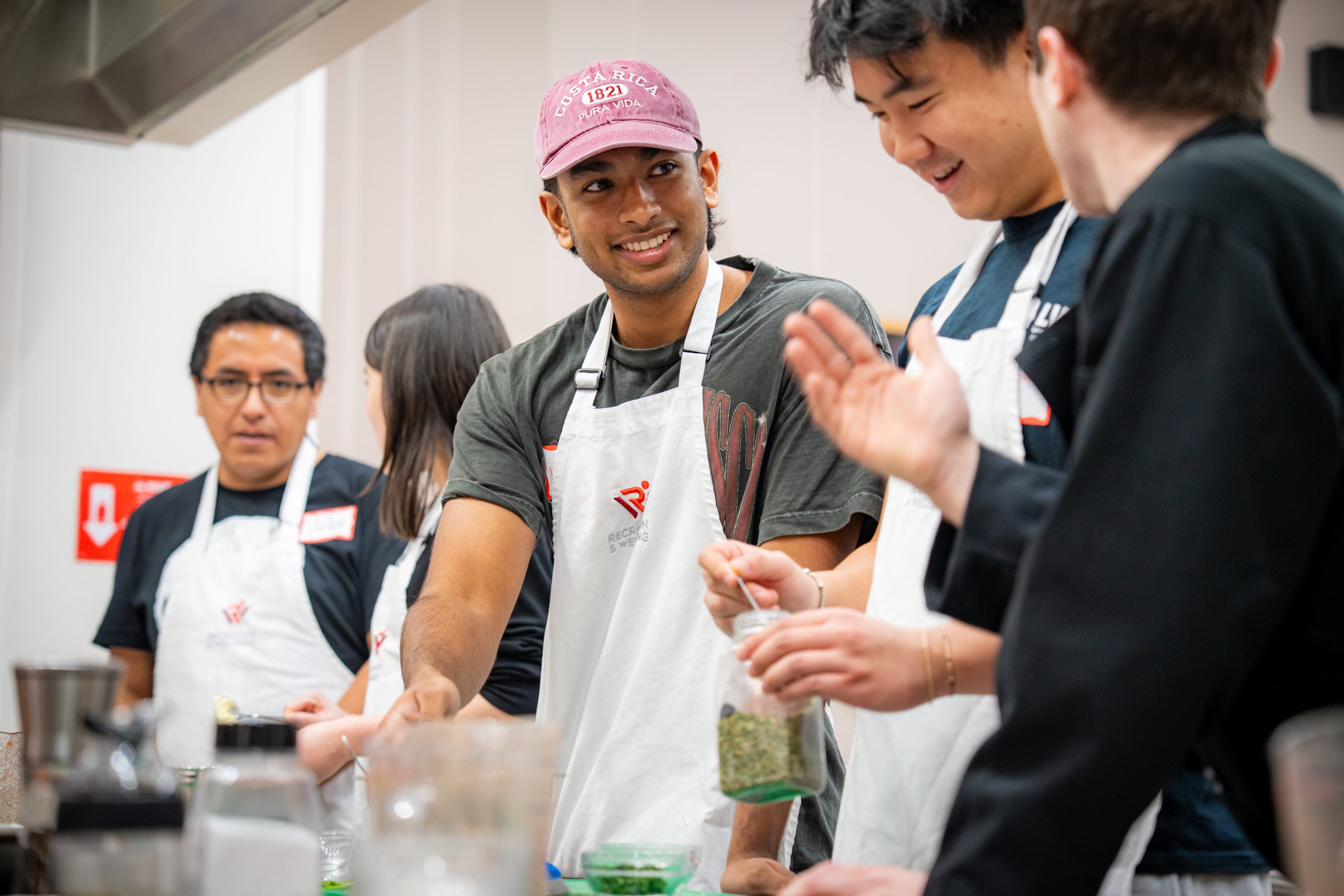 Student smiling during a cooking class.