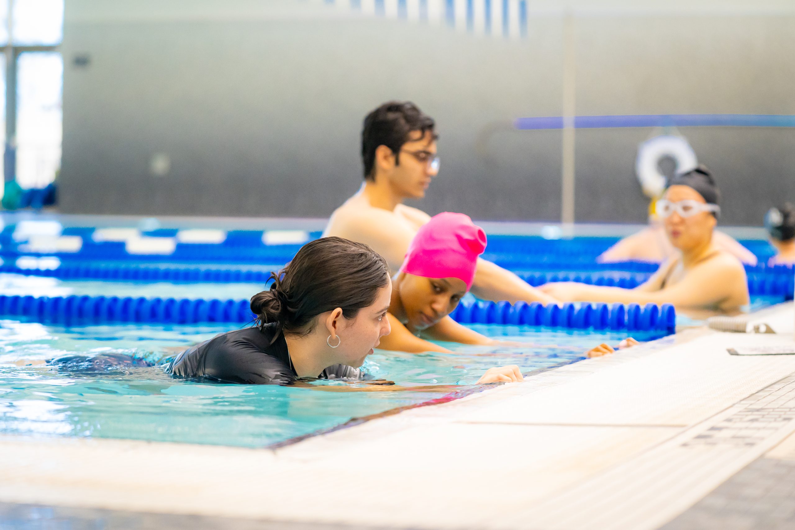 A member and a Rec Well swim instructor during a private swim lesson at the Cove Pool.
